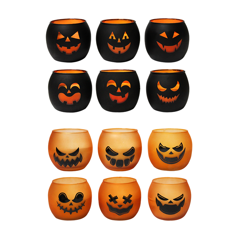 Orange pumpkin ghost face candle